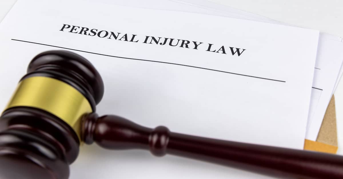 Gavel resting on personal injury claim document | Hauptman, O'Brien, Wolf & Lathrop