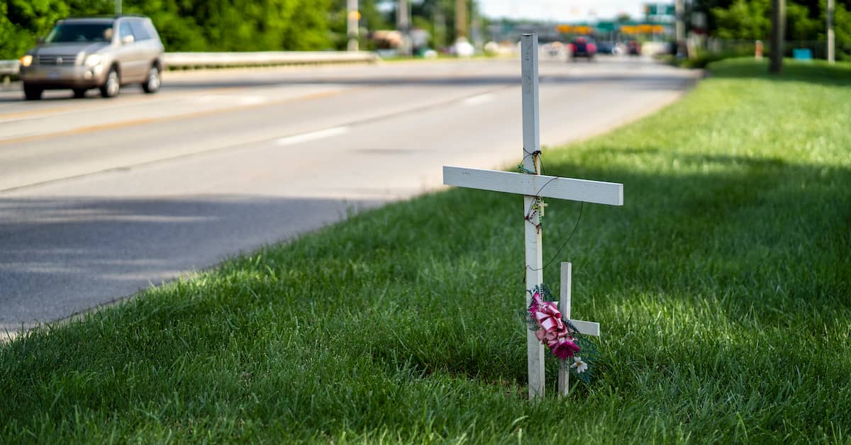 Cross on the side of the road marking the site of a fatal car accident | Hauptman, O'Brien, Wolf & Lathrop