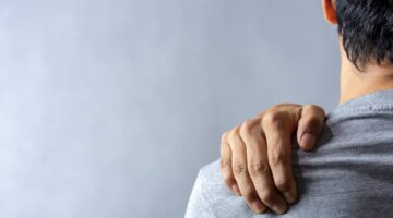 young man with shoulder pain after a car accident