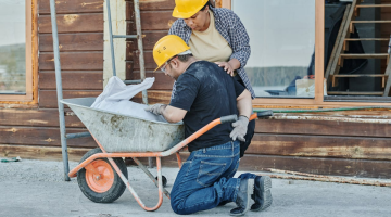 Occupational Diseases: Construction Worker Suffering from Back Pain.