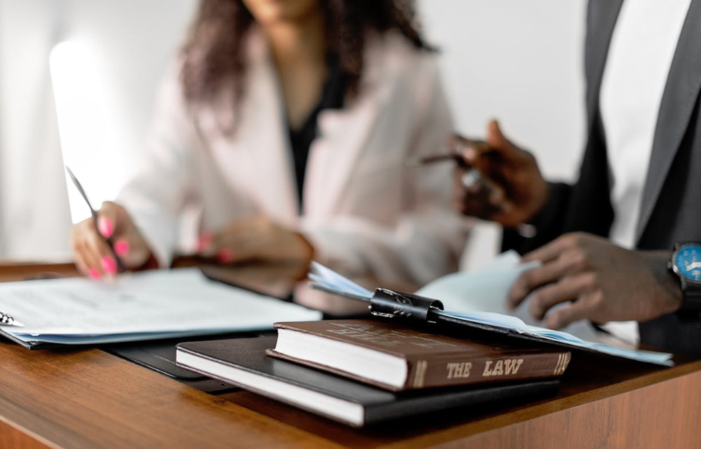 Personal injury attorneys discussing a case.