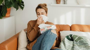 Employee sick with the flu resting at home.