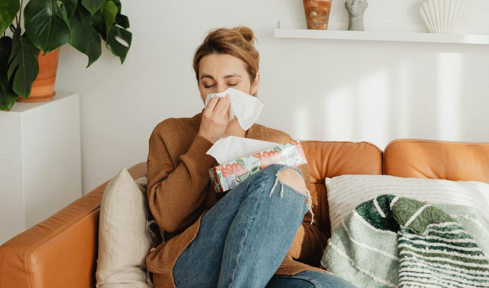 Employee sick with the flu resting at home.