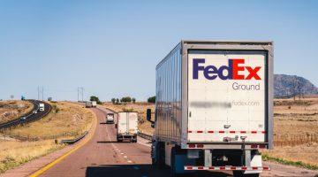 FedEx truck on the road.
